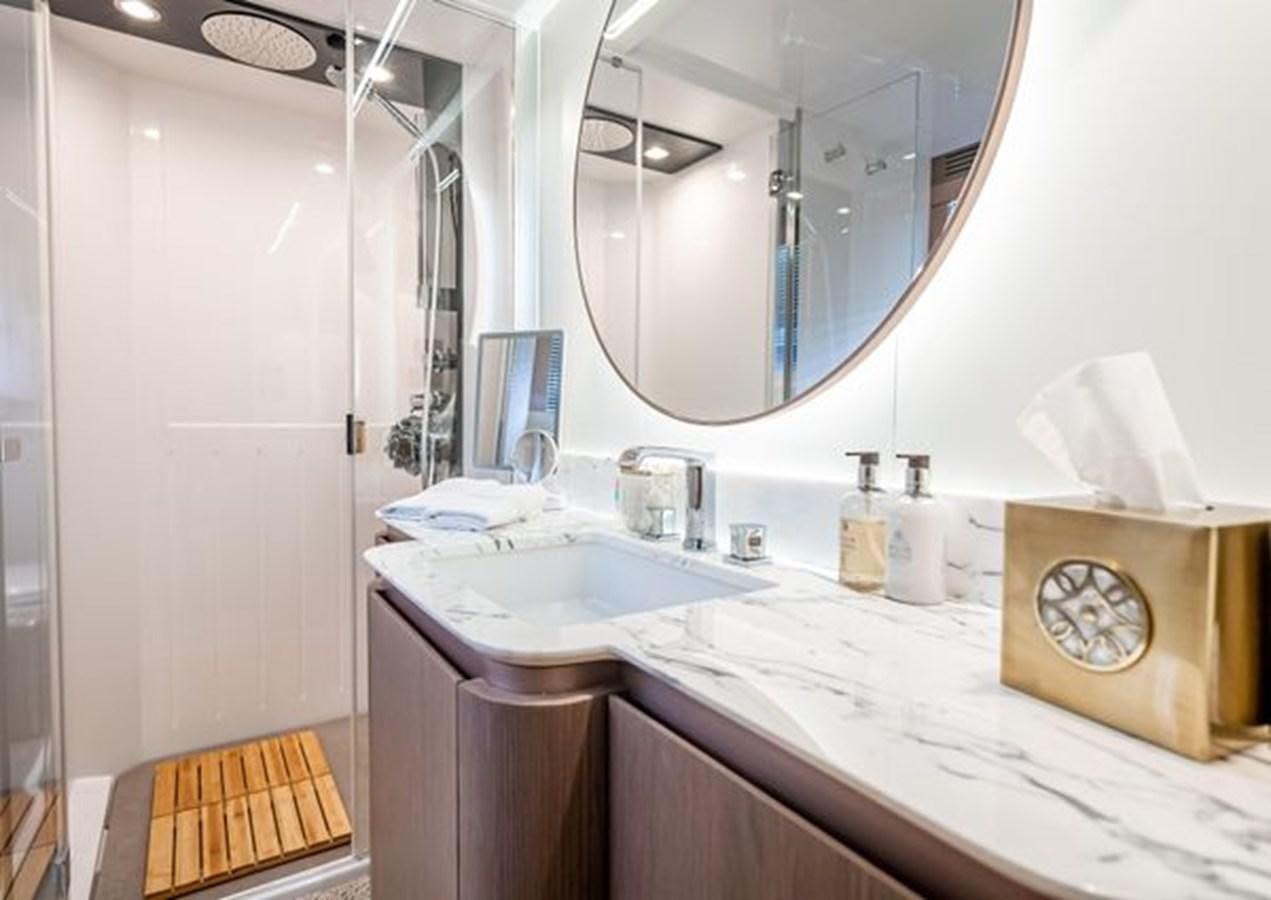 a bathroom with a large mirror aboard AZIMUT MAGELLANO 30/15 Yacht for Sale