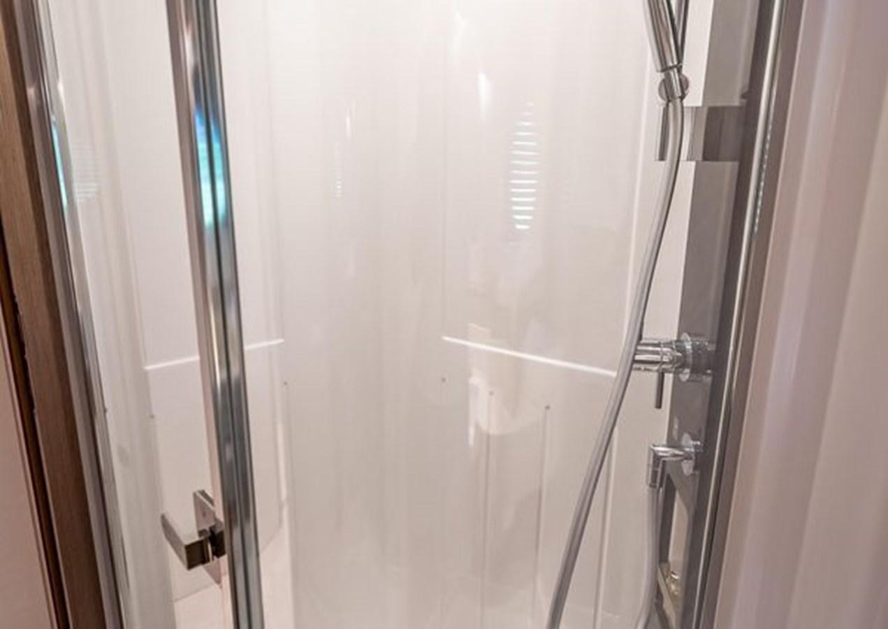 a white door with handles aboard AZIMUT MAGELLANO 30/15 Yacht for Sale