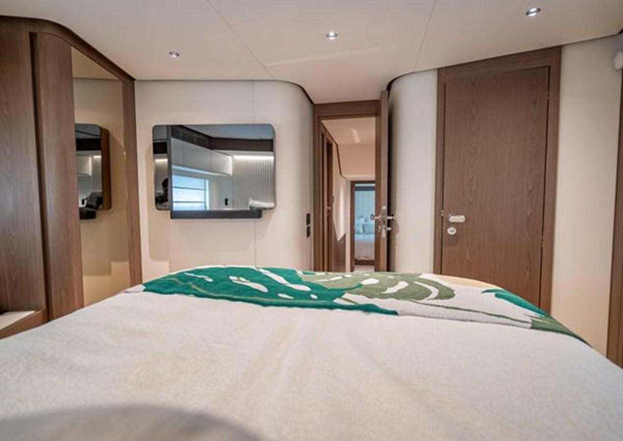 a hotel room with a bed aboard AZIMUT MAGELLANO 30/15 Yacht for Sale