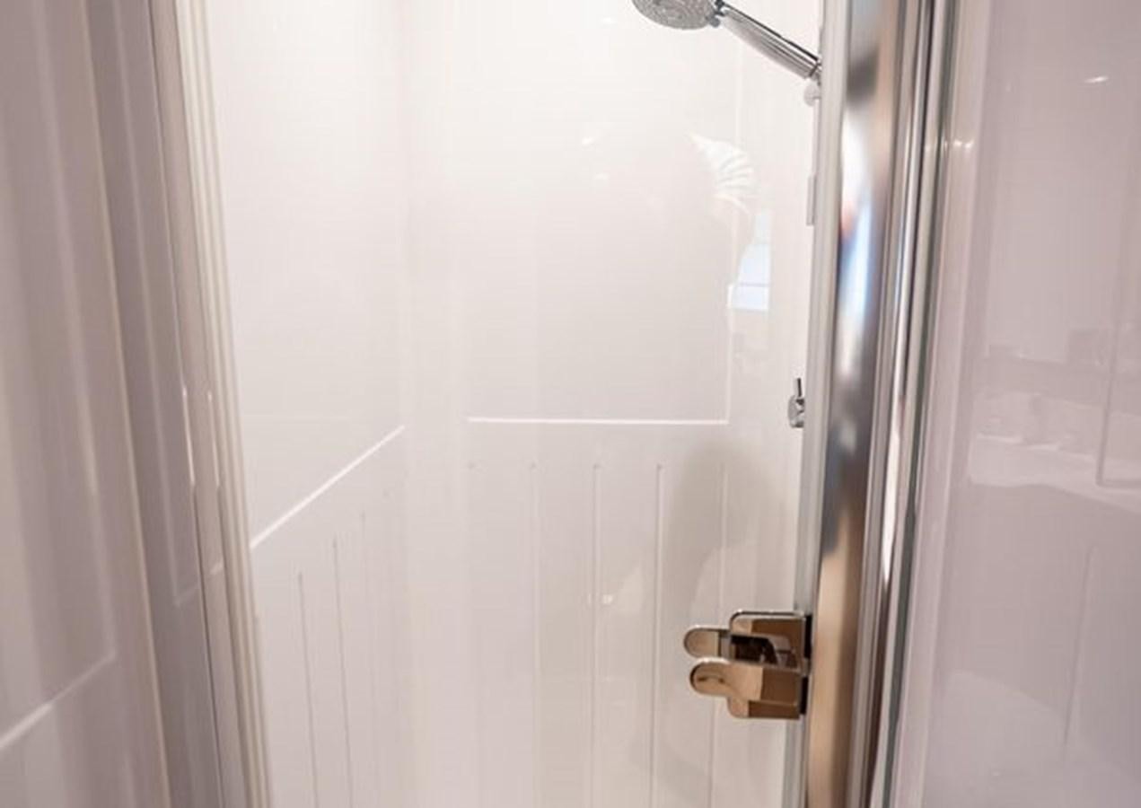 a door with a handle aboard AZIMUT MAGELLANO 30/15 Yacht for Sale