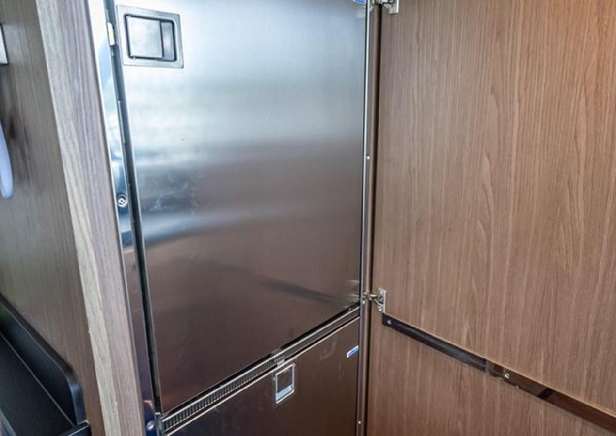 a door with a handle aboard AZIMUT MAGELLANO 30/15 Yacht for Sale