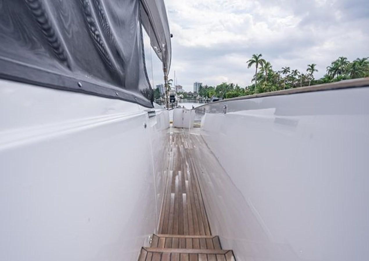 a long hallway with a metal railing aboard AZIMUT MAGELLANO 30/15 Yacht for Sale