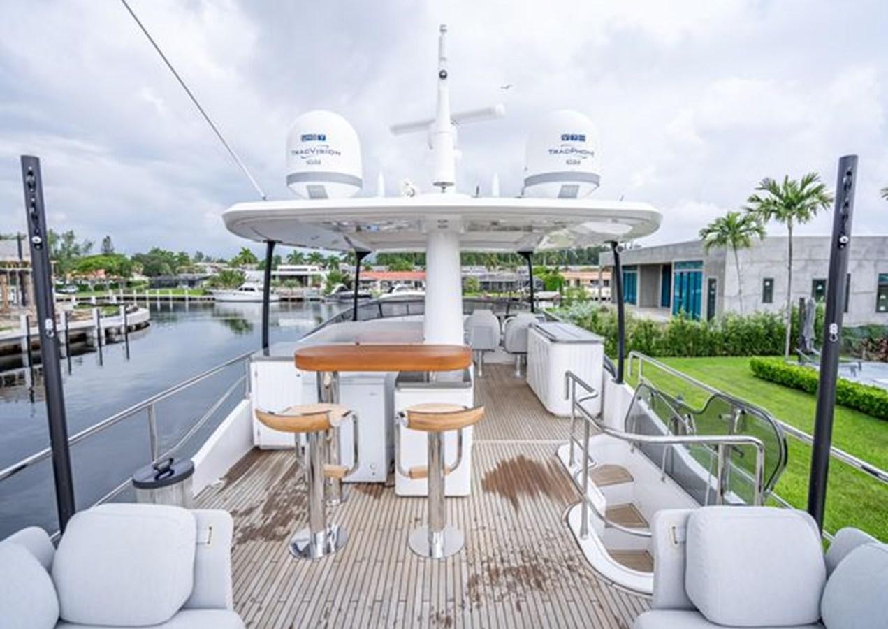 a large white boat on a dock aboard AZIMUT MAGELLANO 30/15 Yacht for Sale
