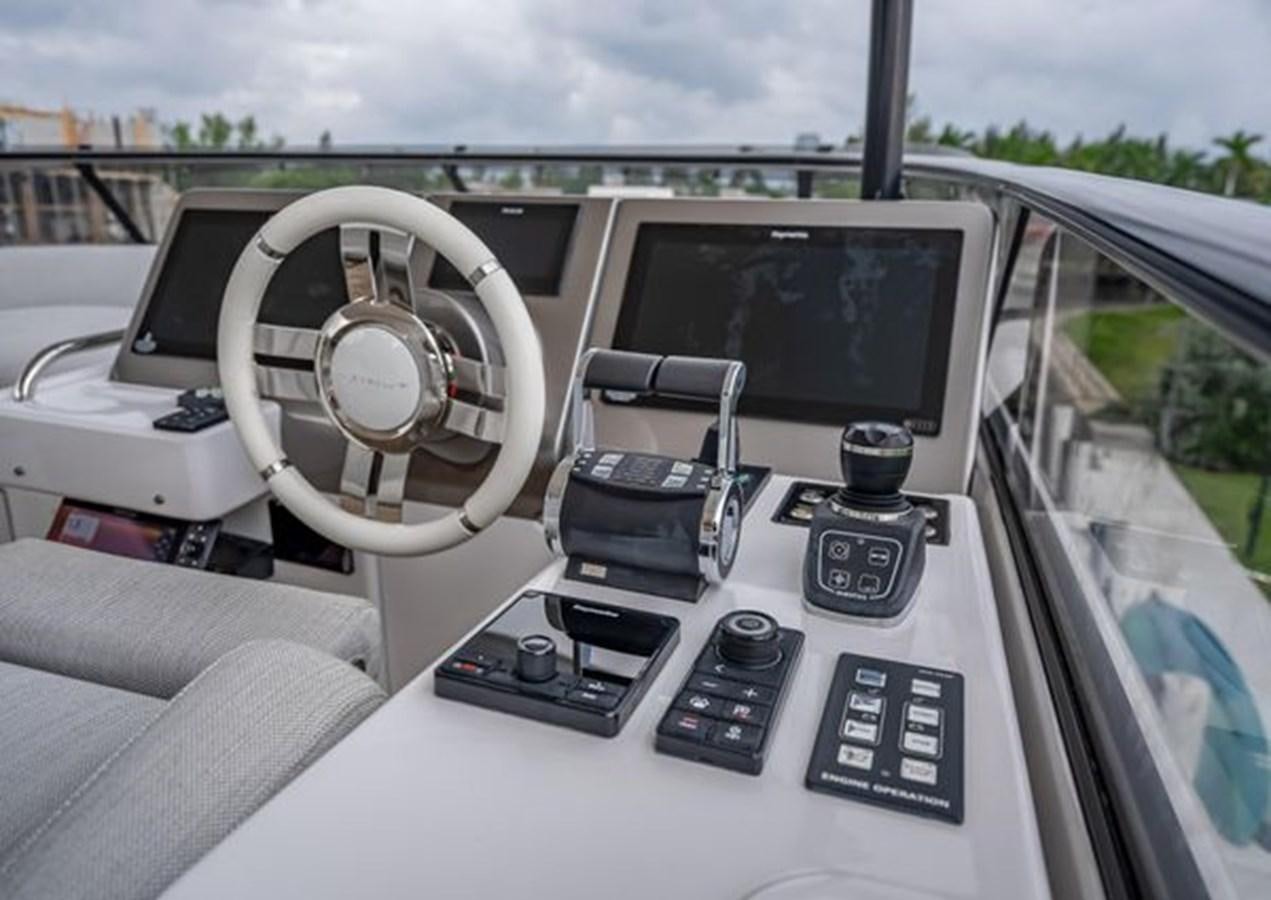 a car with a screen and buttons aboard AZIMUT MAGELLANO 30/15 Yacht for Sale