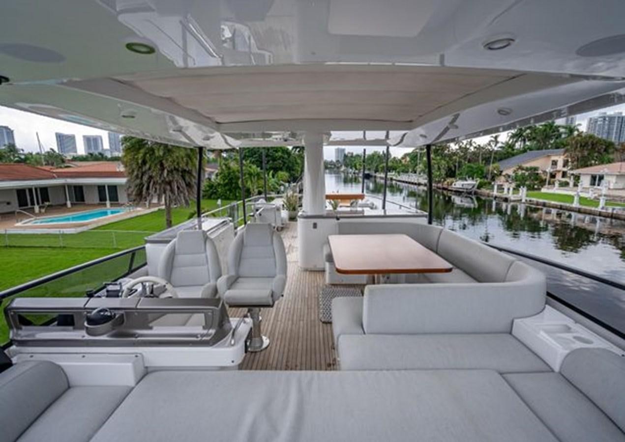 a large lounge area with a pool aboard AZIMUT MAGELLANO 30/15 Yacht for Sale