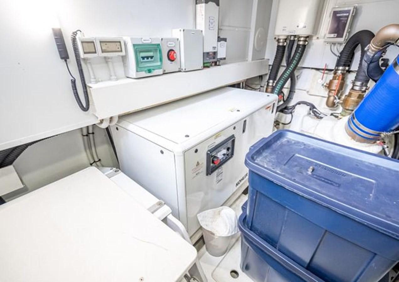 a machine in a room aboard AZIMUT MAGELLANO 30/15 Yacht for Sale