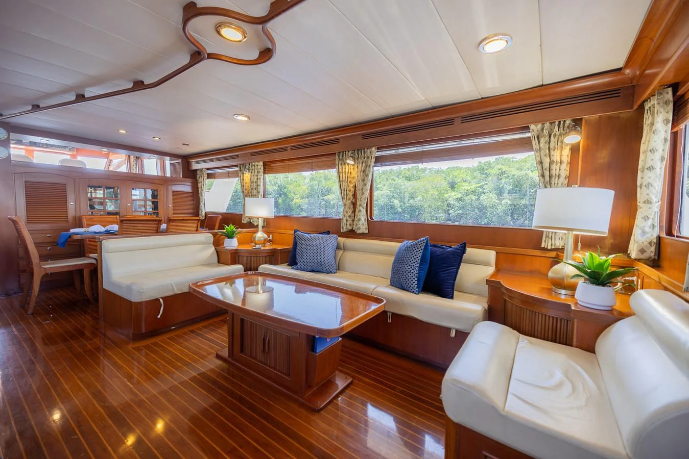 a living room with a large window aboard THE GARLIC Yacht for Sale