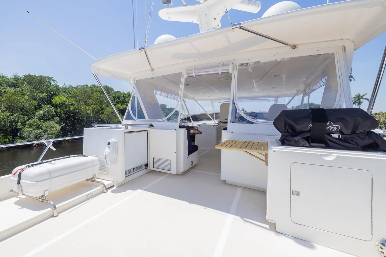 a white tent with a white roof aboard THE GARLIC Yacht for Sale