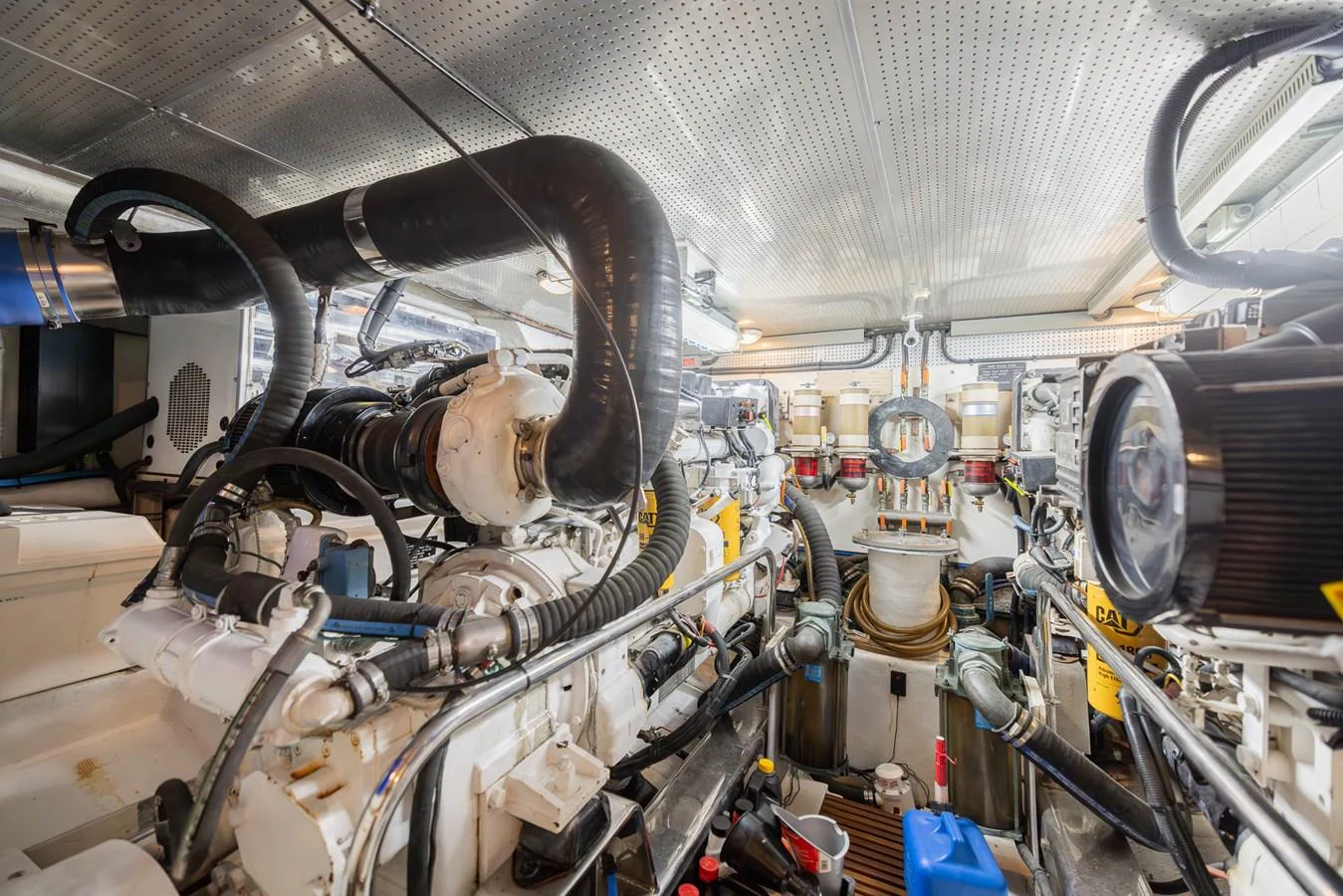 a large room with many pipes aboard THE GARLIC Yacht for Sale