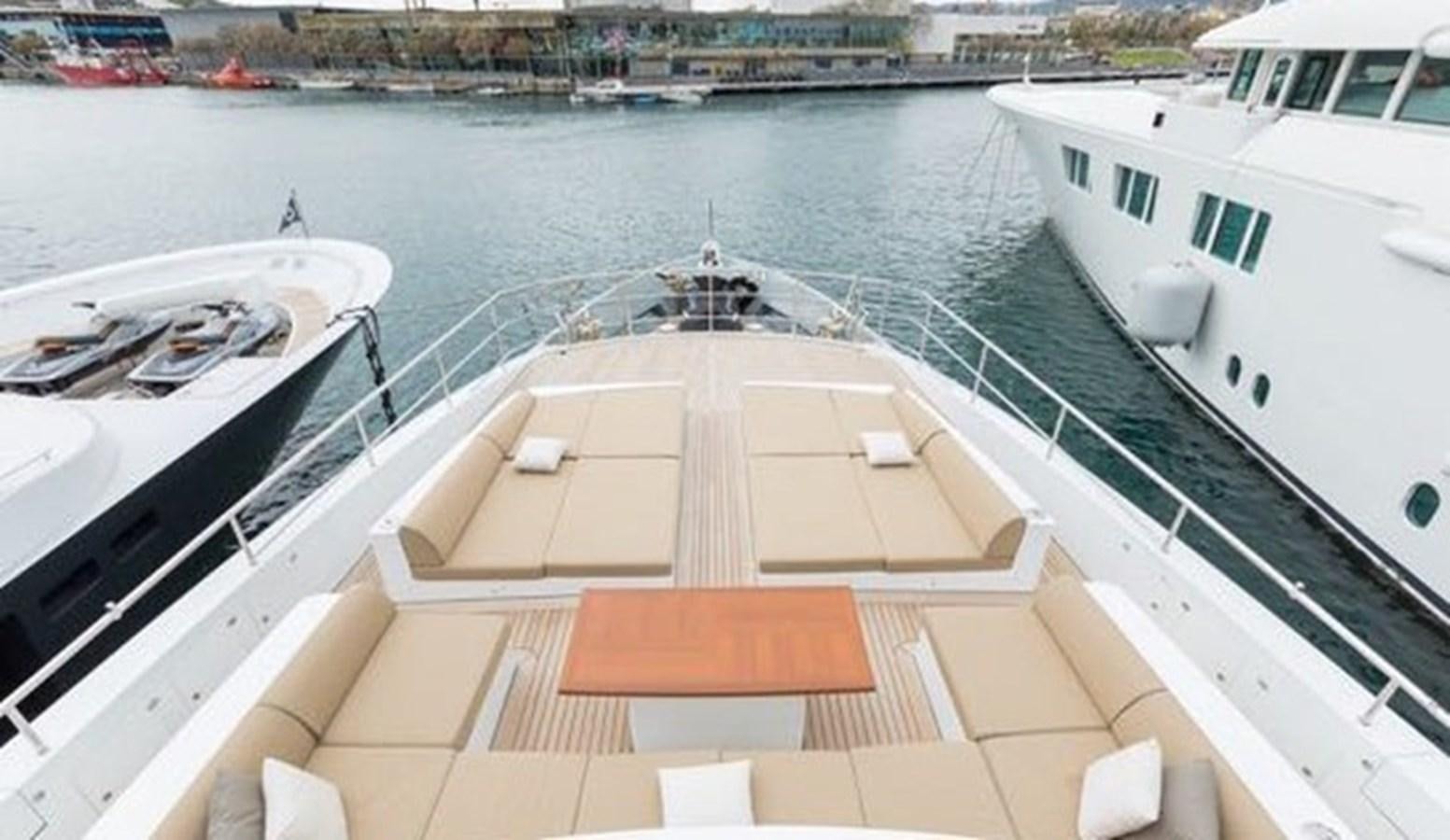 a deck with a boat on it aboard BENETTI 132 Yacht for Sale