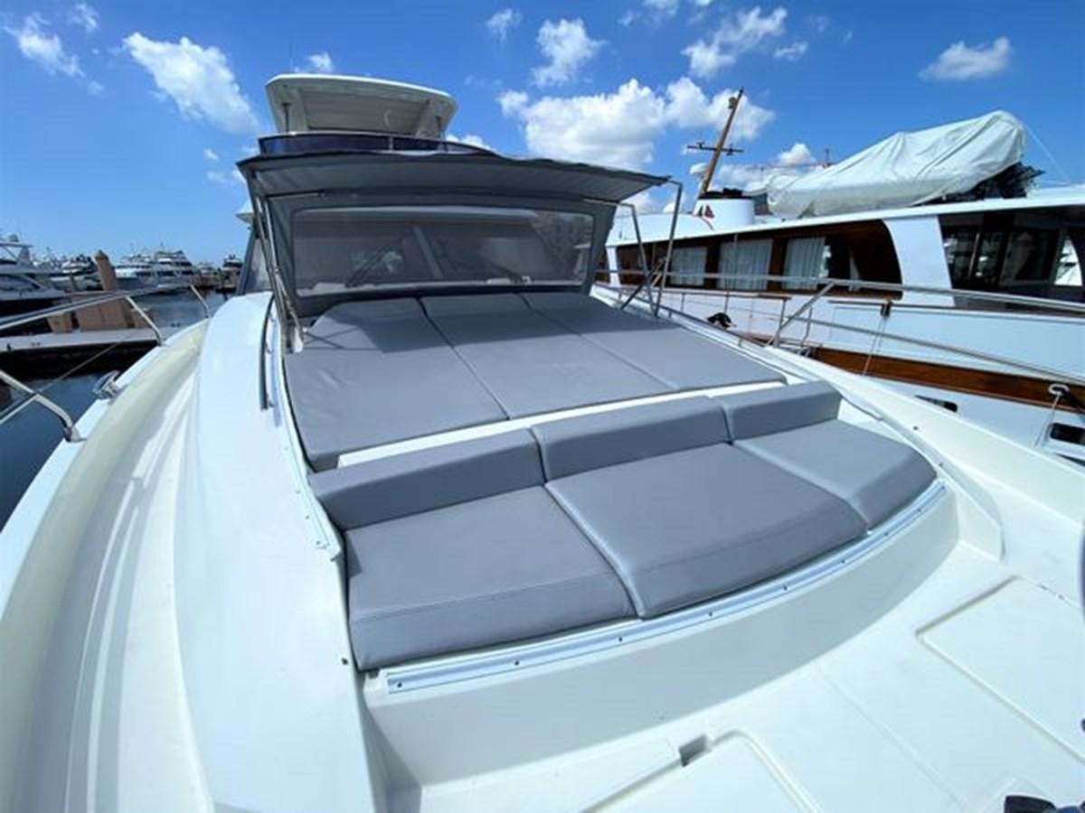 a white yacht with a large white boat on it aboard 2016 PRESTIGE 680 FLY Yacht for Sale