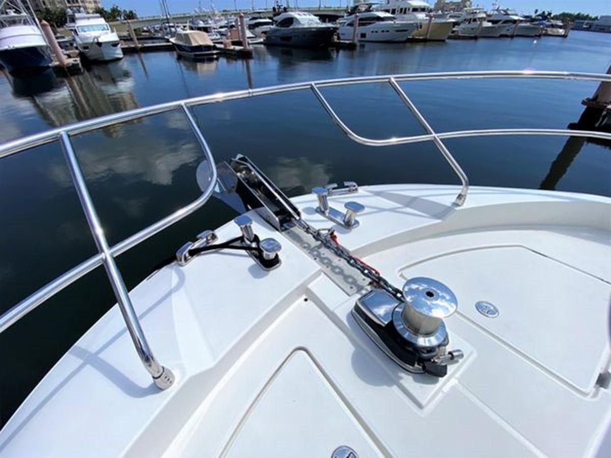 a motorboat on the water aboard 2016 PRESTIGE 680 FLY Yacht for Sale
