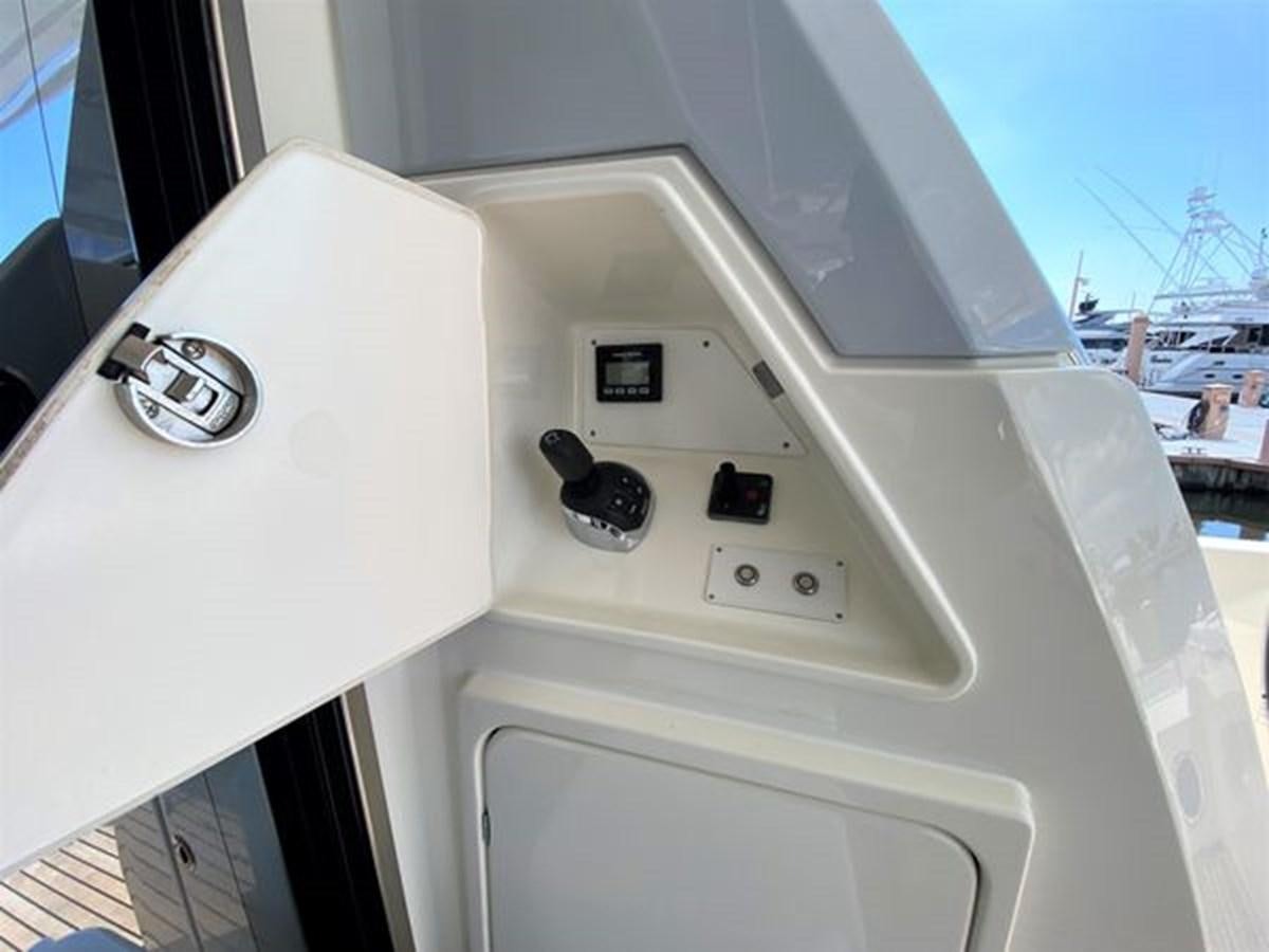 a white machine with buttons aboard 2016 PRESTIGE 680 FLY Yacht for Sale