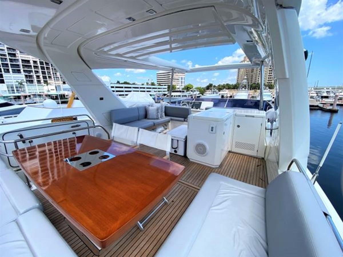 a boat with a large deck aboard 2016 PRESTIGE 680 FLY Yacht for Sale