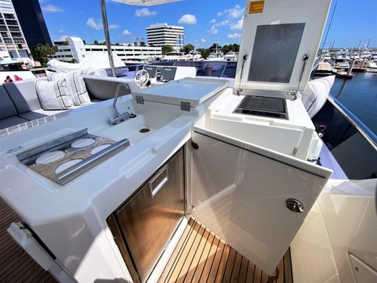 a large white boat with a screen on the front aboard 2016 PRESTIGE 680 FLY Yacht for Sale