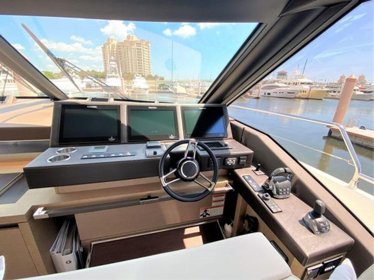 a boat on the water aboard 2016 PRESTIGE 680 FLY Yacht for Sale