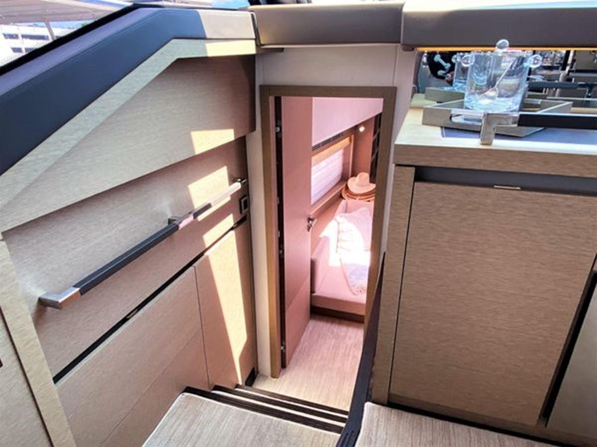 a room with a cabinet and sink aboard 2016 PRESTIGE 680 FLY Yacht for Sale