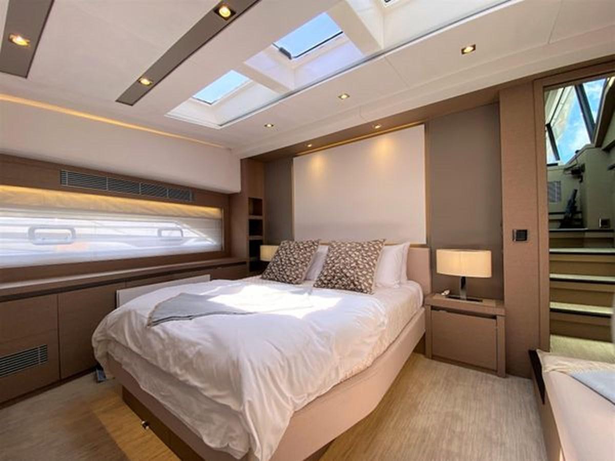 a room with two beds aboard 2016 PRESTIGE 680 FLY Yacht for Sale