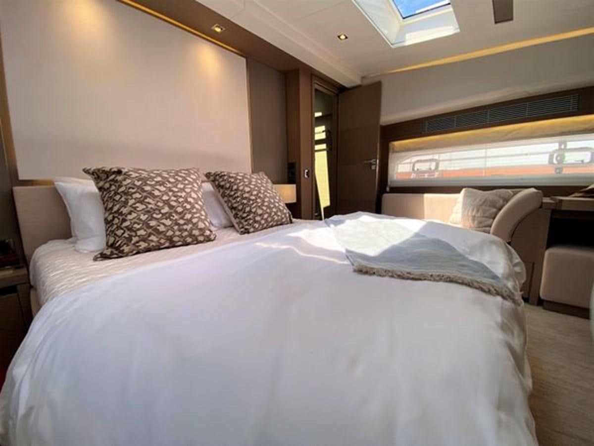 a bed with pillows aboard 2016 PRESTIGE 680 FLY Yacht for Sale