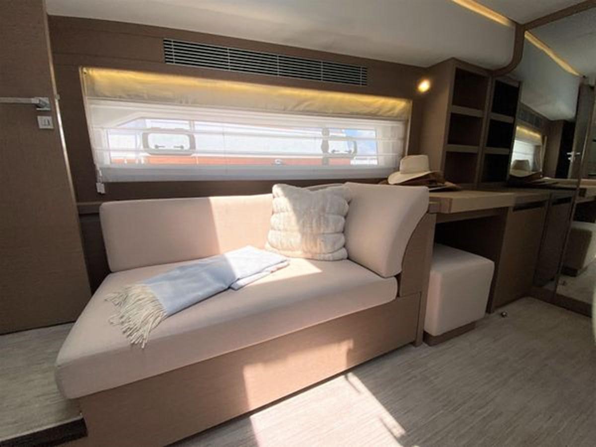 a bed in a room aboard 2016 PRESTIGE 680 FLY Yacht for Sale