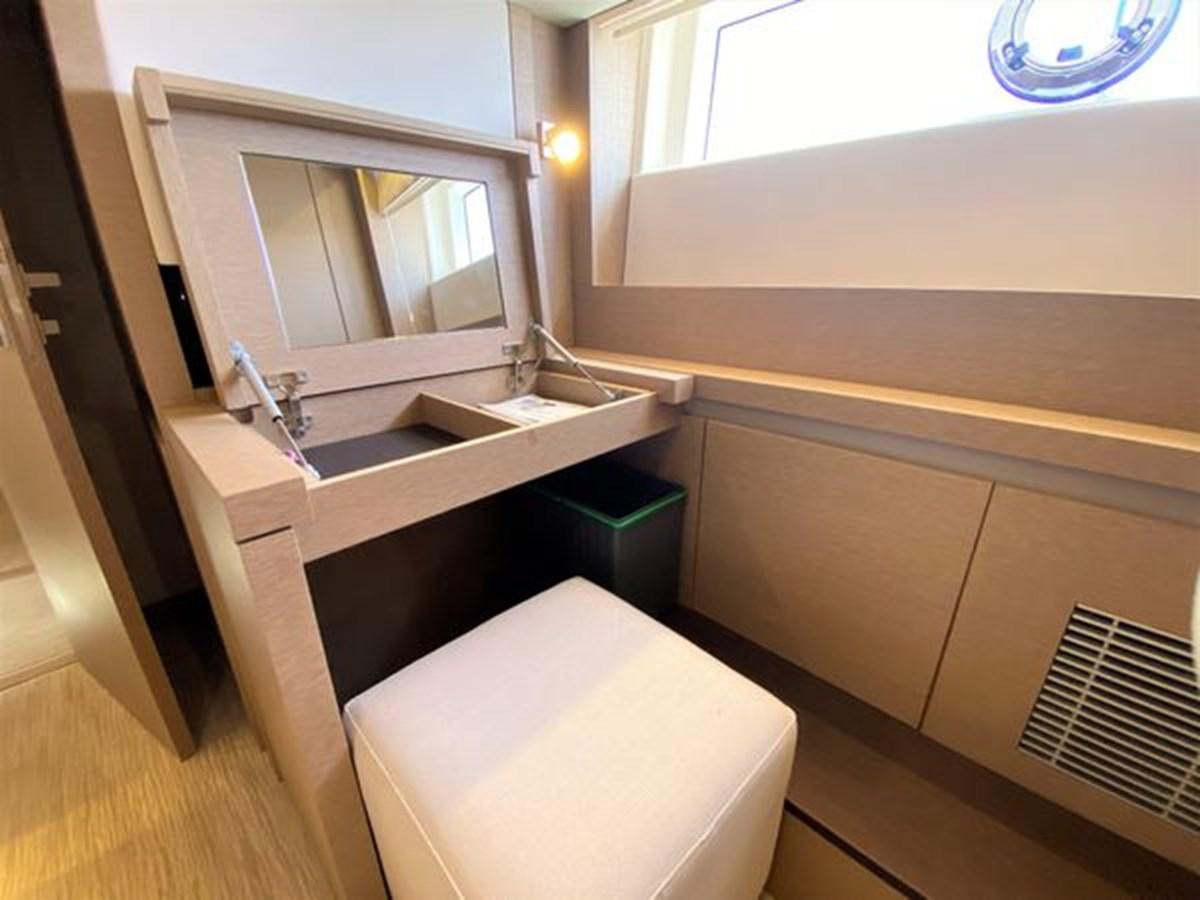 a bathroom with a sink and a toilet aboard 2016 PRESTIGE 680 FLY Yacht for Sale