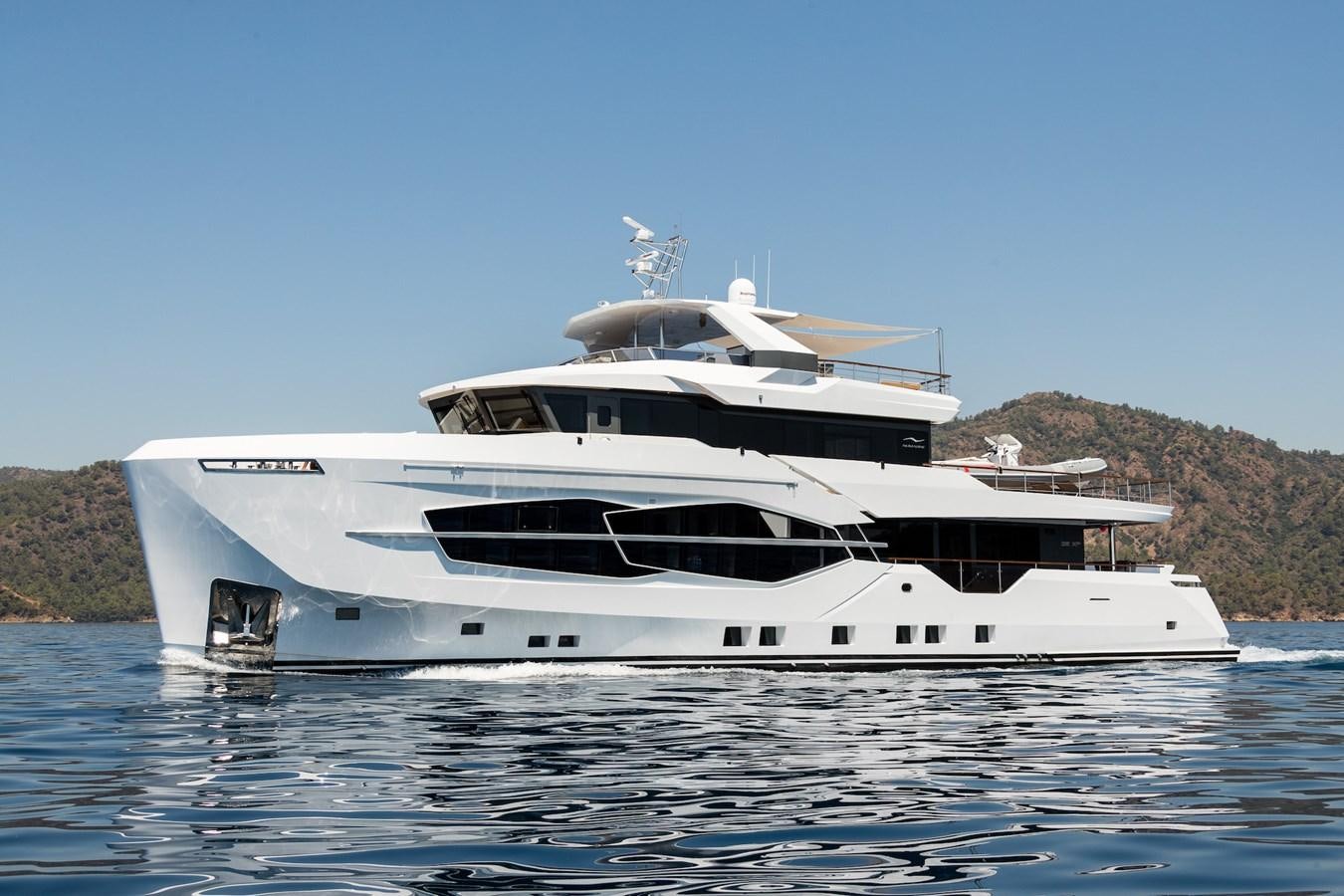 a white yacht on the water aboard PROJECT 105 Yacht for Sale