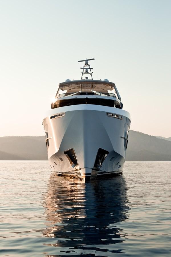 a white boat in the water aboard PROJECT 105 Yacht for Sale