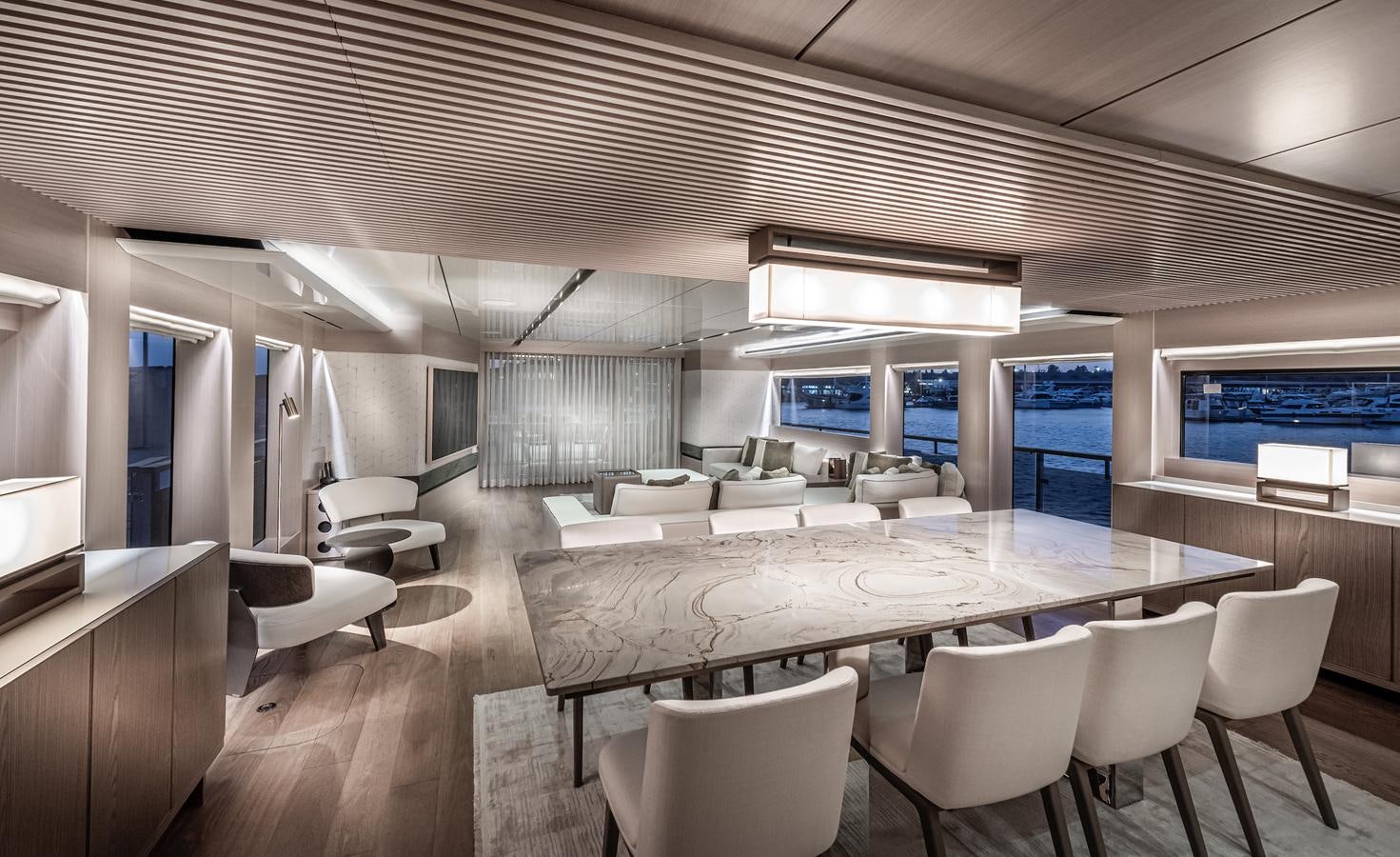 a room with a table chairs and a large window aboard PROJECT 105 Yacht for Sale