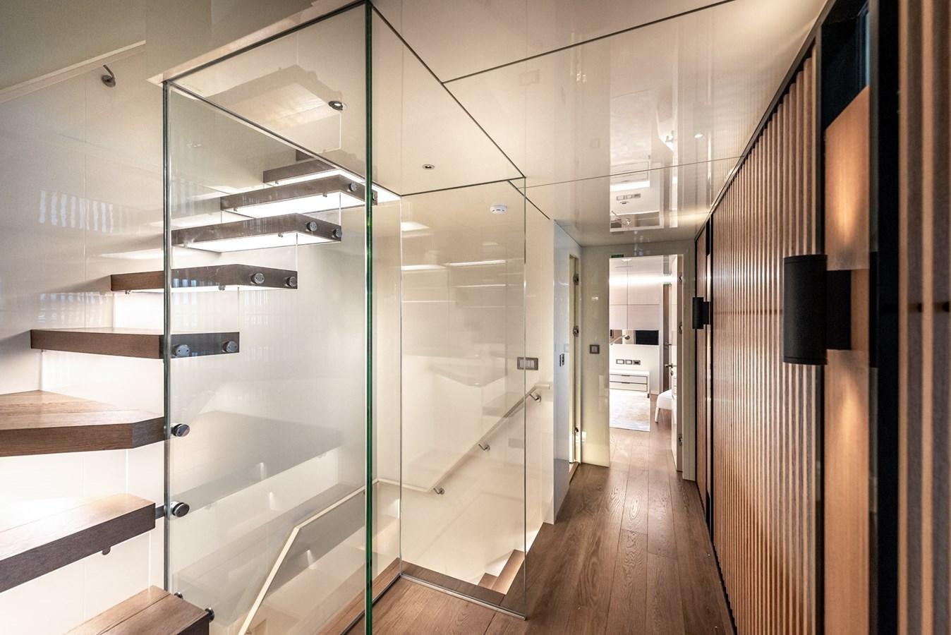 a room with a glass wall aboard PROJECT 105 Yacht for Sale