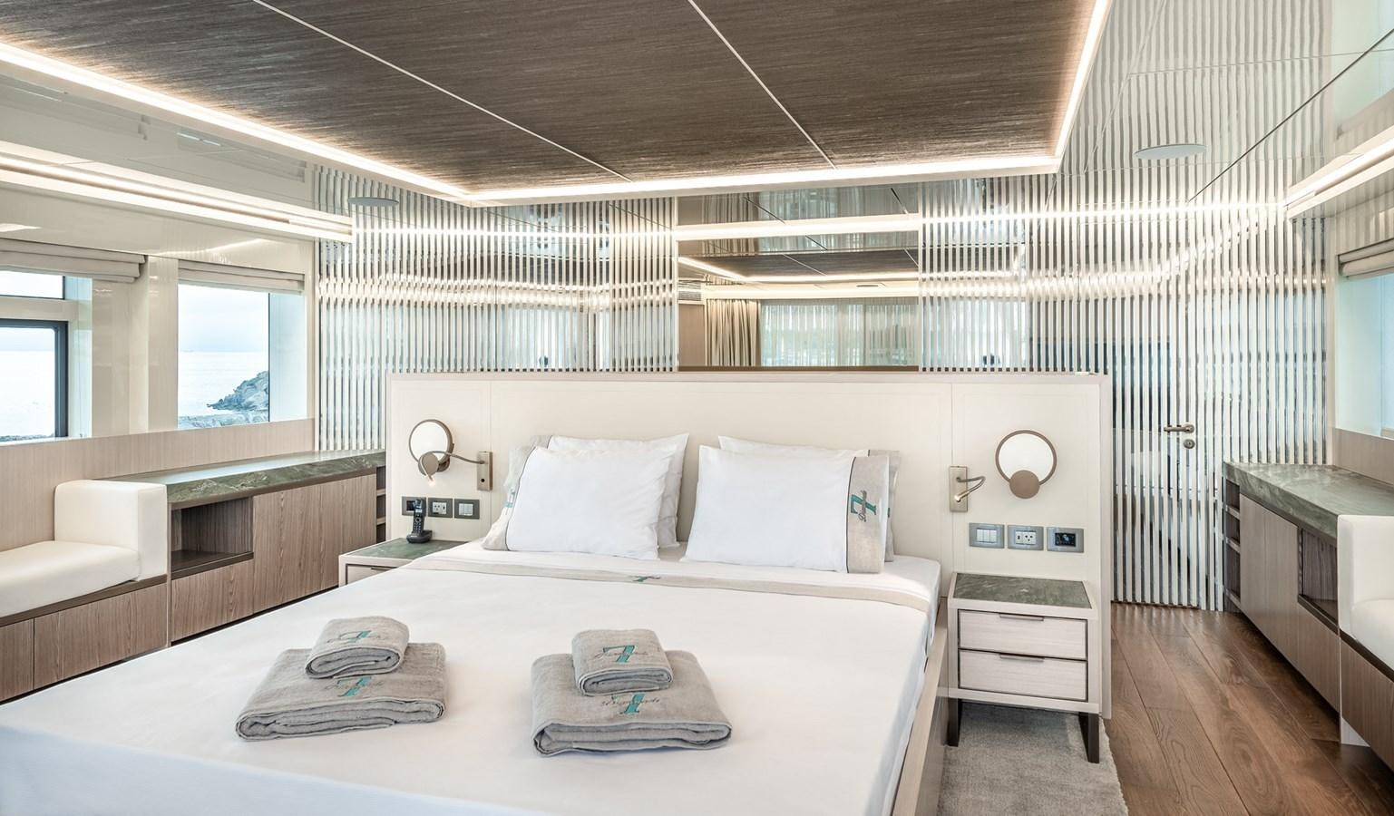 a large white bed in a room aboard PROJECT 105 Yacht for Sale