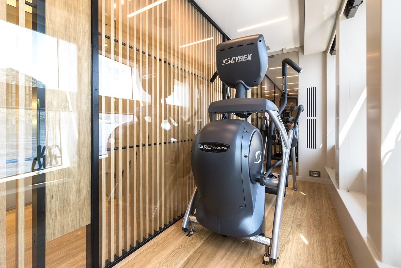 a black camera on a tripod aboard PROJECT 105 Yacht for Sale