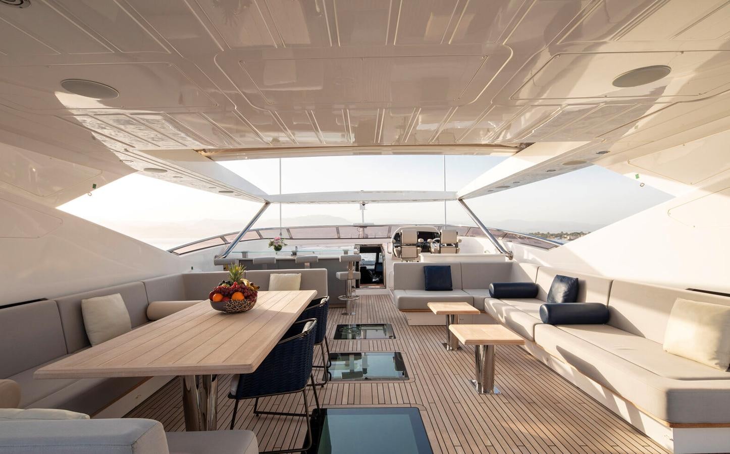 an empty airplane with chairs and tables aboard 2018 SUNSEEKER 116 Yacht for Sale