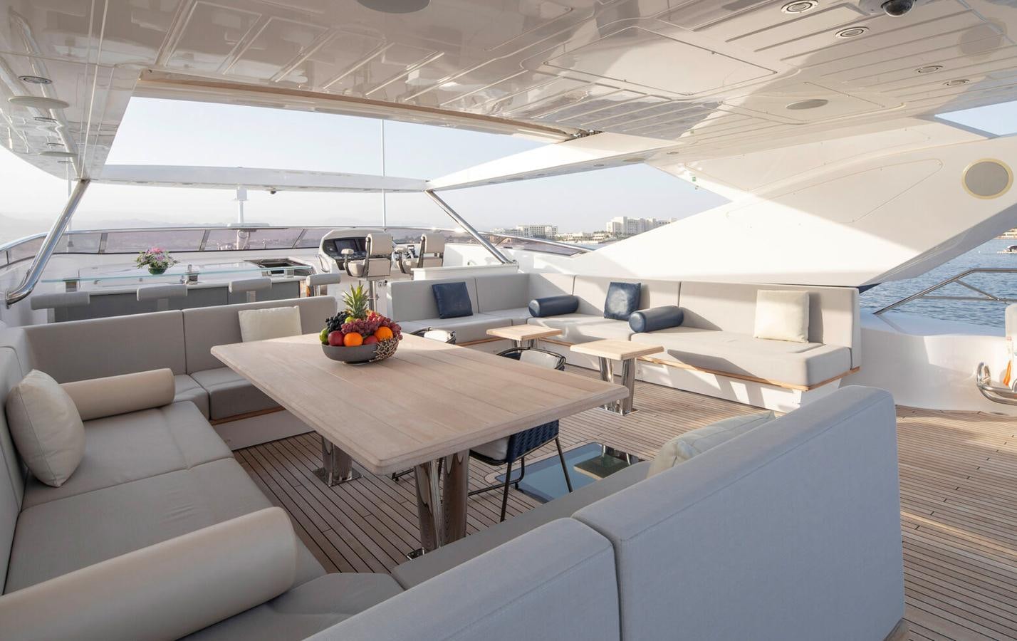 a room with a table and chairs aboard 2018 SUNSEEKER 116 Yacht for Sale