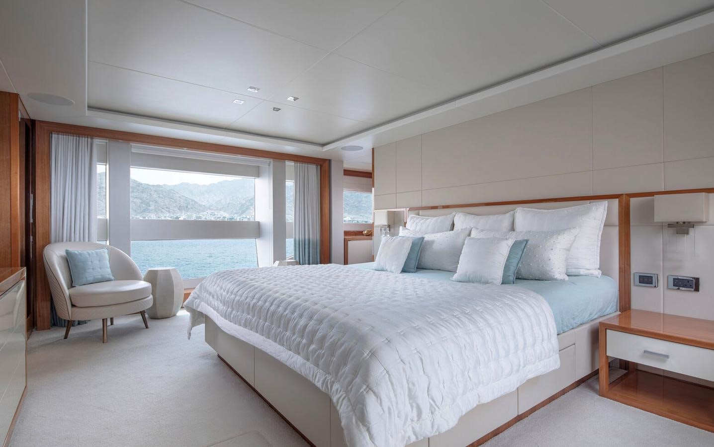 a large bed in a room aboard 2018 SUNSEEKER 116 Yacht for Sale