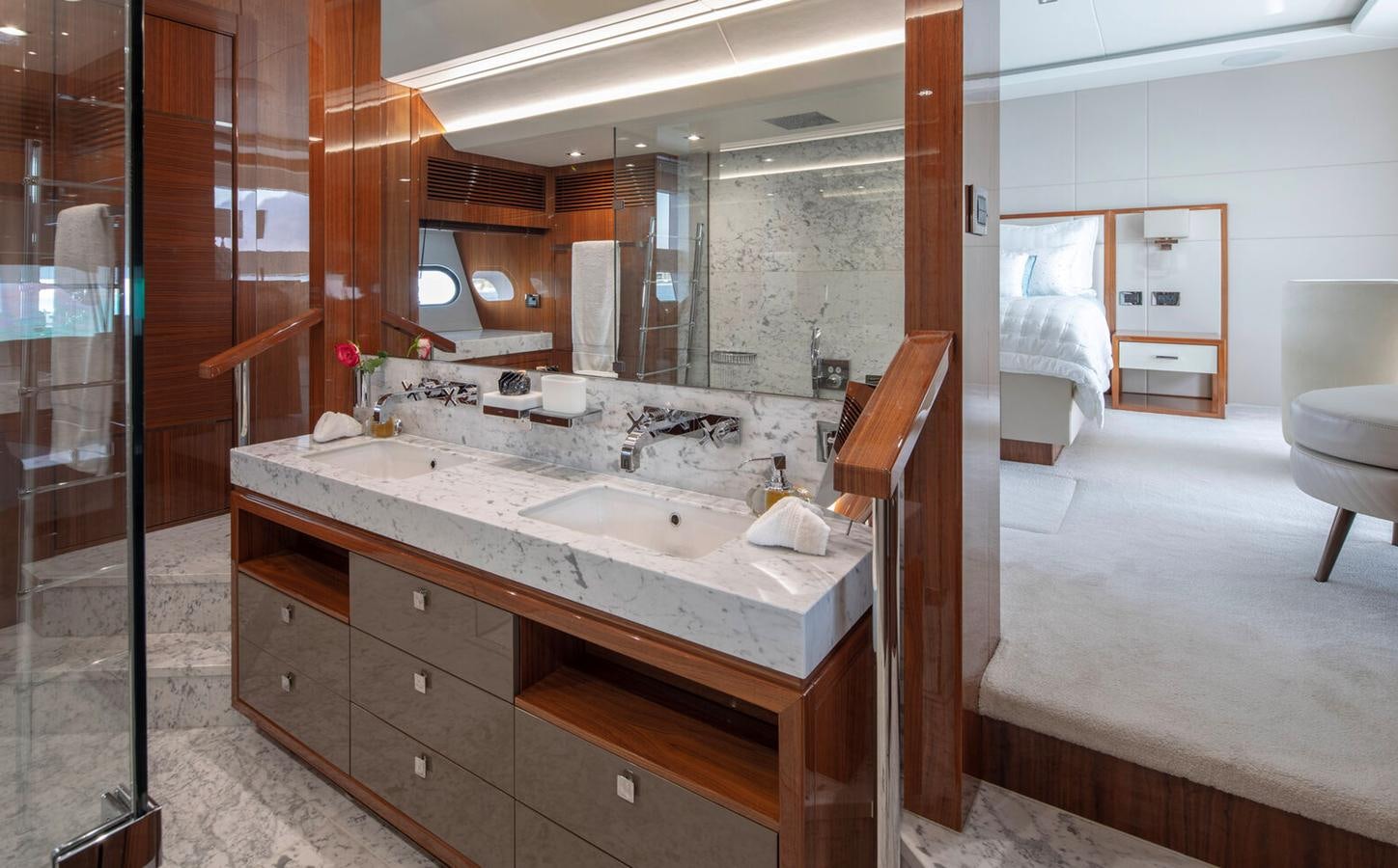 a bathroom with a sink and a mirror aboard 2018 SUNSEEKER 116 Yacht for Sale
