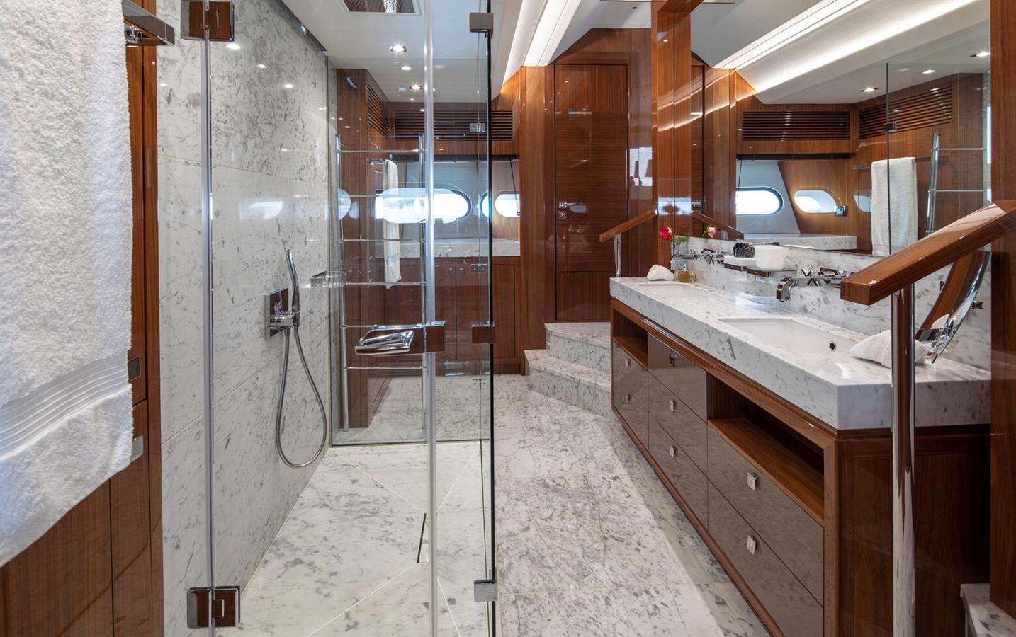 a bathroom with a sink and a shower aboard 2018 SUNSEEKER 116 Yacht for Sale