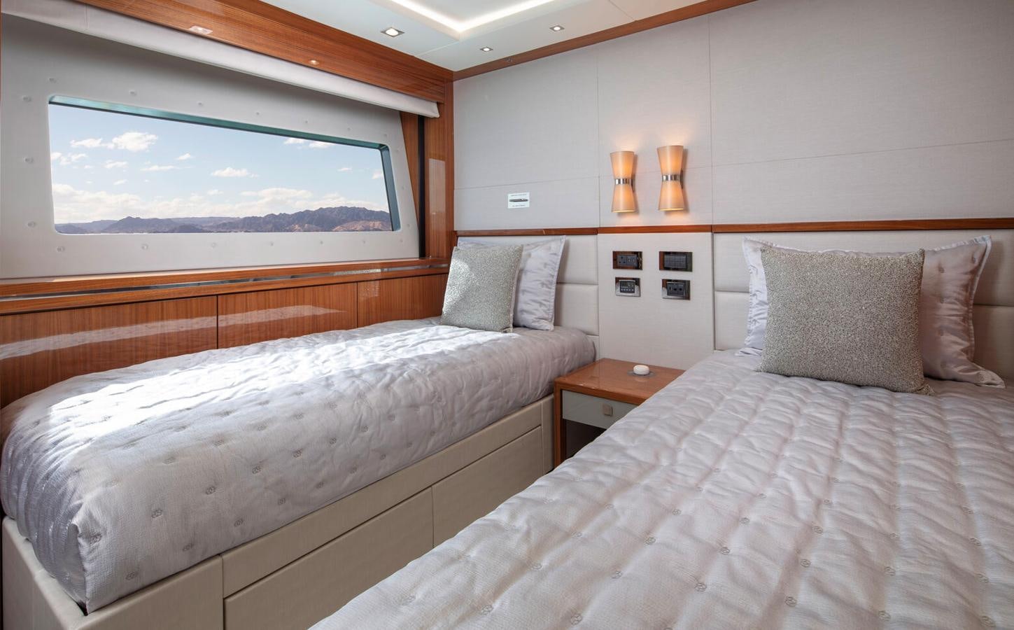 a couple of beds in a room aboard 2018 SUNSEEKER 116 Yacht for Sale