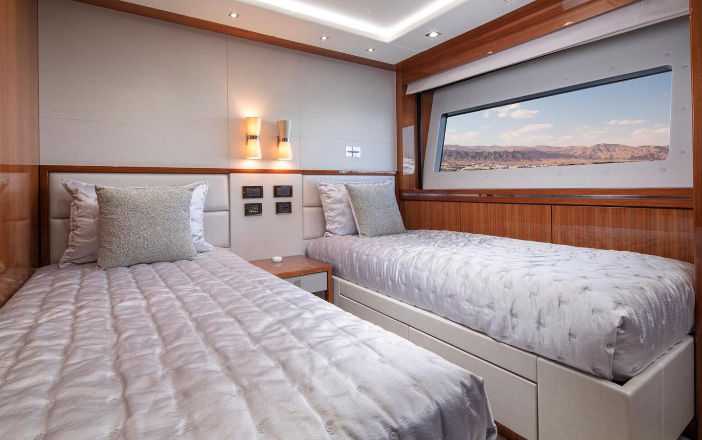 a couple of beds in a hotel room aboard 2018 SUNSEEKER 116 Yacht for Sale