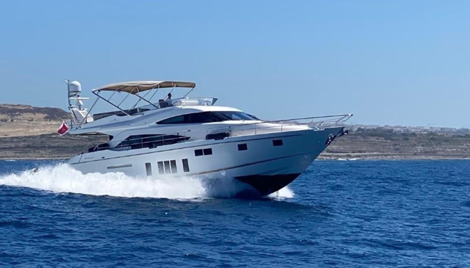 a white yacht on the water aboard LANA 1 Yacht for Sale