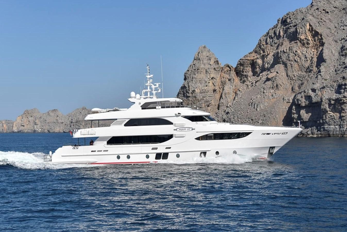 a white yacht in the water aboard 'H Yacht for Sale