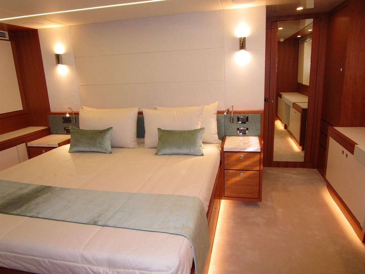 a hotel room with two beds aboard JOHNSON 83 SKYLOUNGE Yacht for Sale