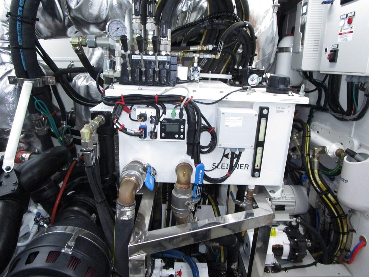 a machine with wires aboard JOHNSON 83 SKYLOUNGE Yacht for Sale
