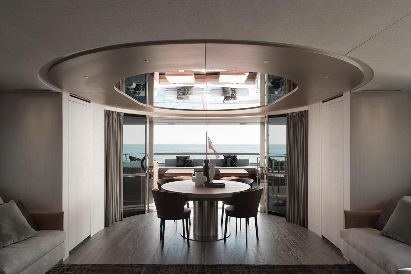 a room with a table and chairs aboard ALEGRIA Y Yacht for Sale