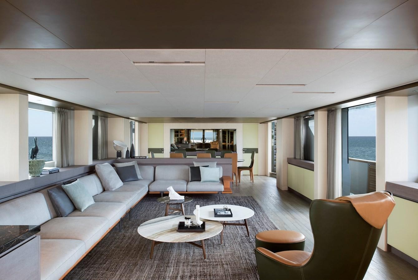 a living room with a couch and a table aboard ALEGRIA Y Yacht for Sale