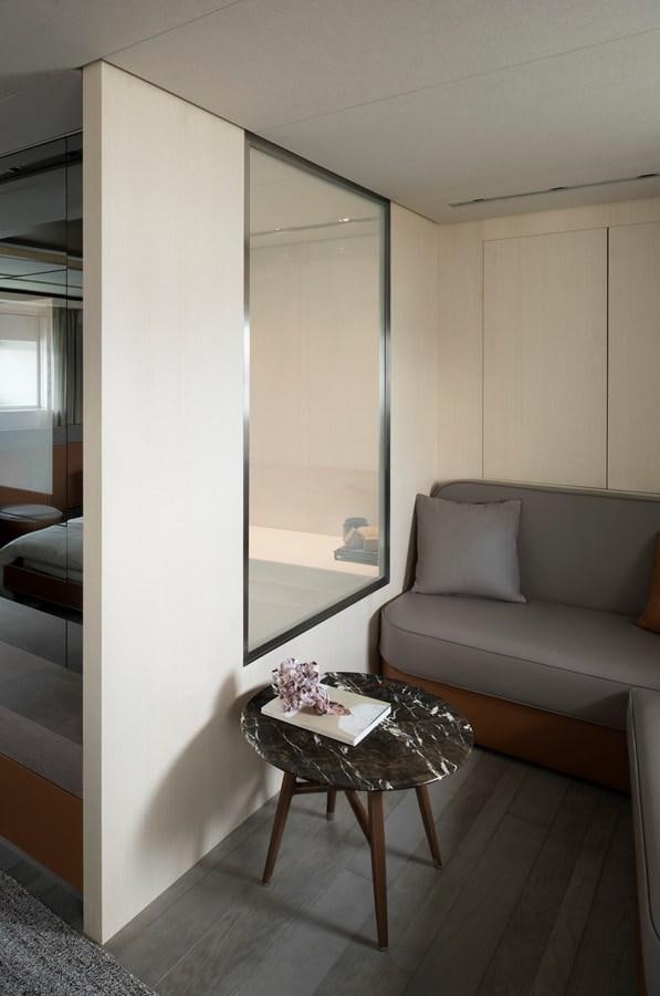 a living room with a large window aboard ALEGRIA Y Yacht for Sale