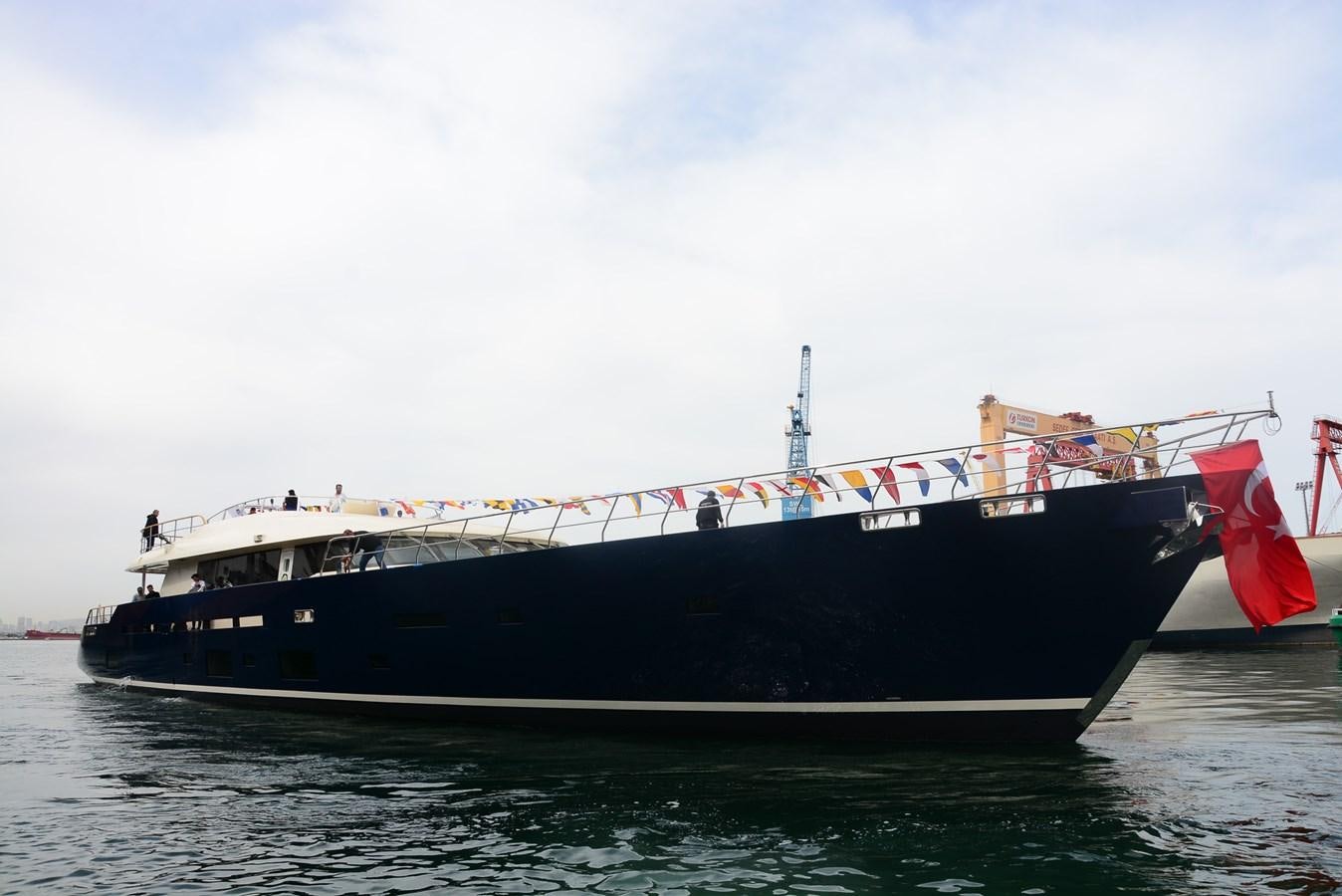 a large boat on the water aboard LEGATO Yacht for Sale