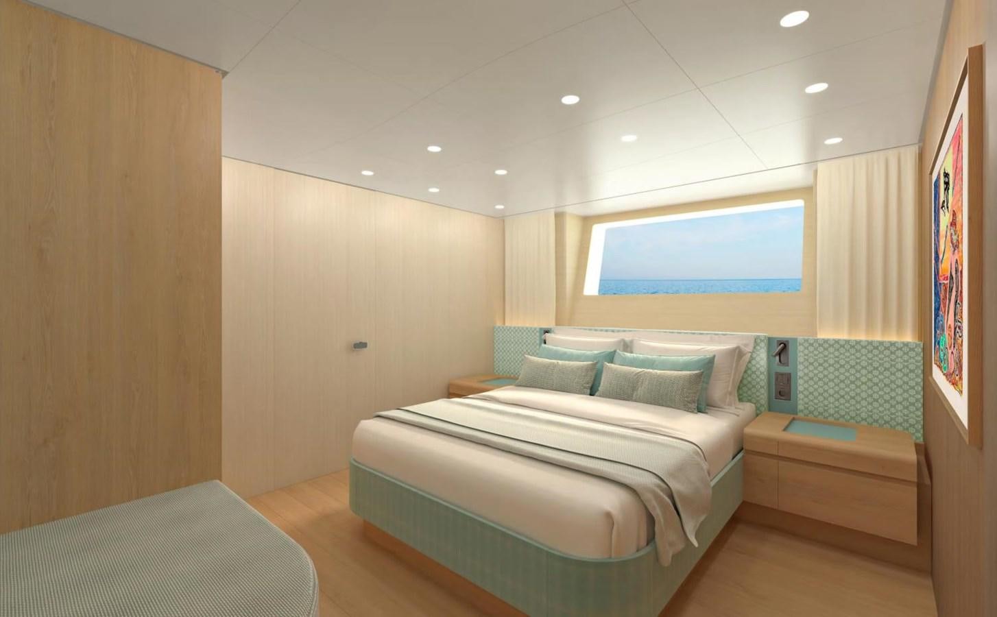 a room with a bed and a window aboard LEGATO Yacht for Sale