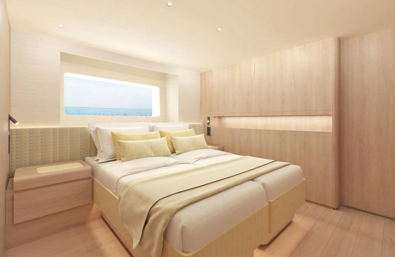 a bed in a room aboard LEGATO Yacht for Sale