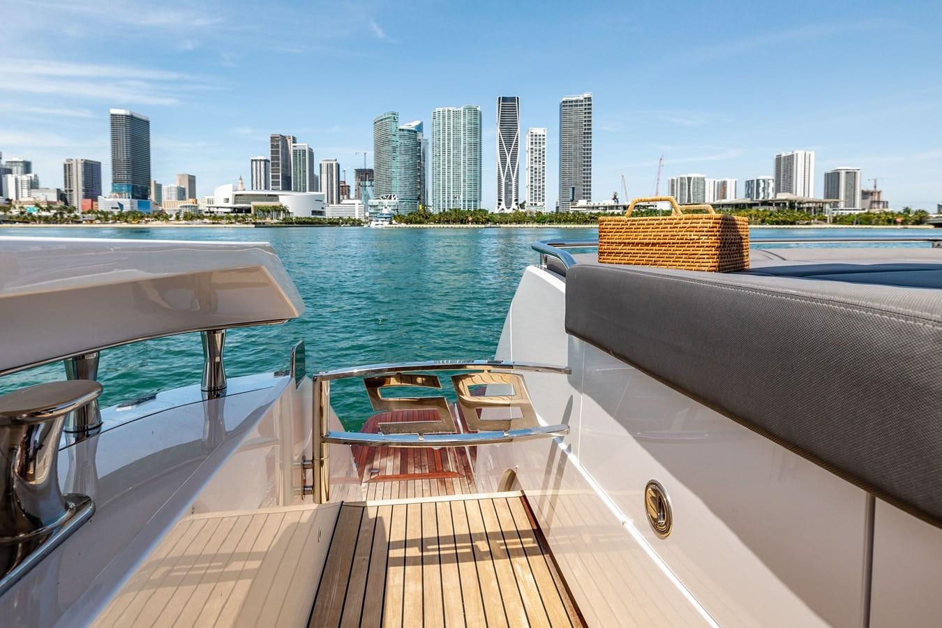 a deck with a view of a city and water aboard DOUBLE OR NOTHING Yacht for Sale