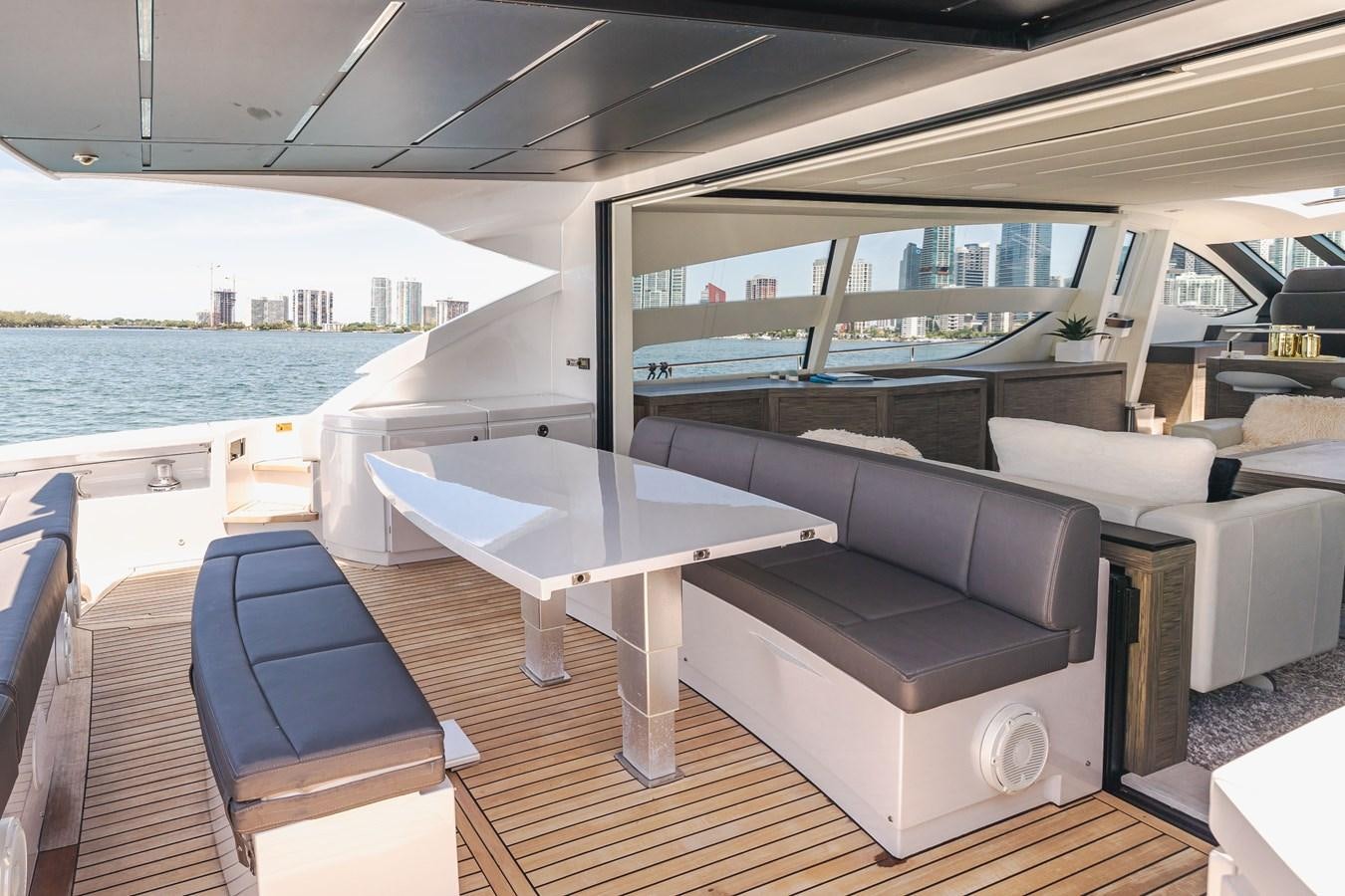 a room with a table and chairs aboard DOUBLE OR NOTHING Yacht for Sale